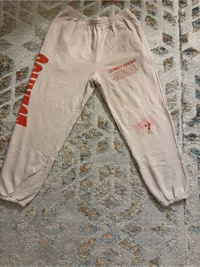 LONELY GHOST Cream Sweatpants with Red Graphic Accents